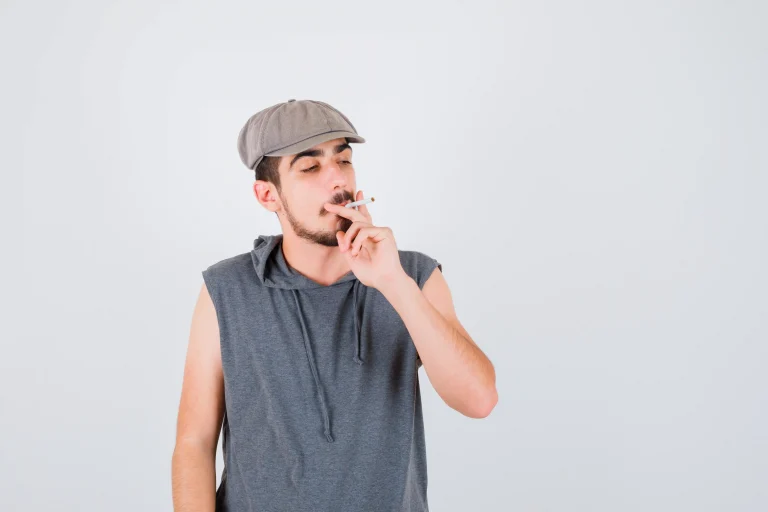 1 young-worker-smoking-cigarette